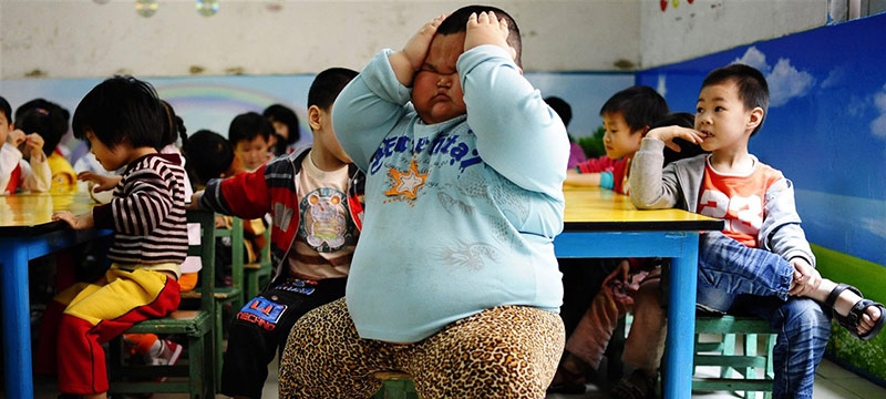 Escuela china sancionará a los alumnos que suban de peso