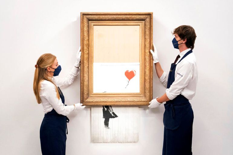 Obra autodestruida de Banksy se vende en $ 25,4 millones