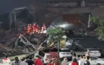 Decenas de personas atrapadas por el colapso de un hotel usado para la cuarentena del virus de Wuhan (fotos)