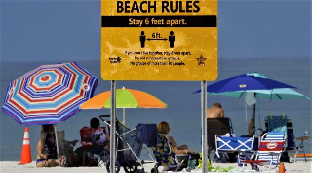 Más de 2.000 nuevos casos de COVID-19 en Florida a medida que abren más playas