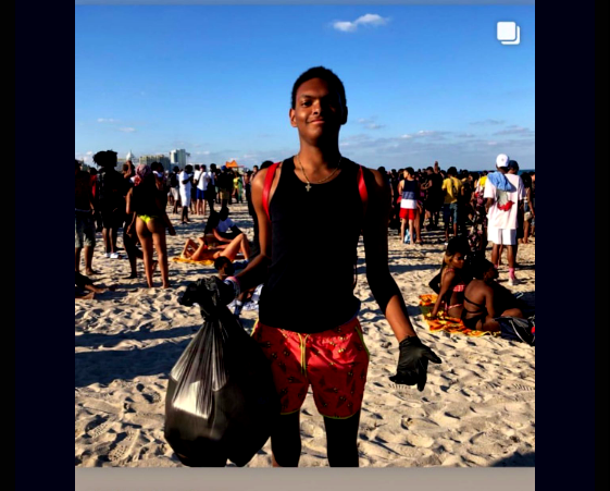 Foto de joven de Georgia recogiendo la basura de Miami Beach causa revuelo en las redes sociales