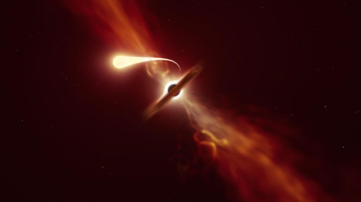 Astrónomos captan en imágenes como un agujero negro succiona una estrella parecida a nuestro Sol